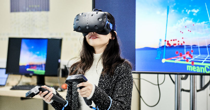 A researcher wearing a VR headset in one of our laboratories